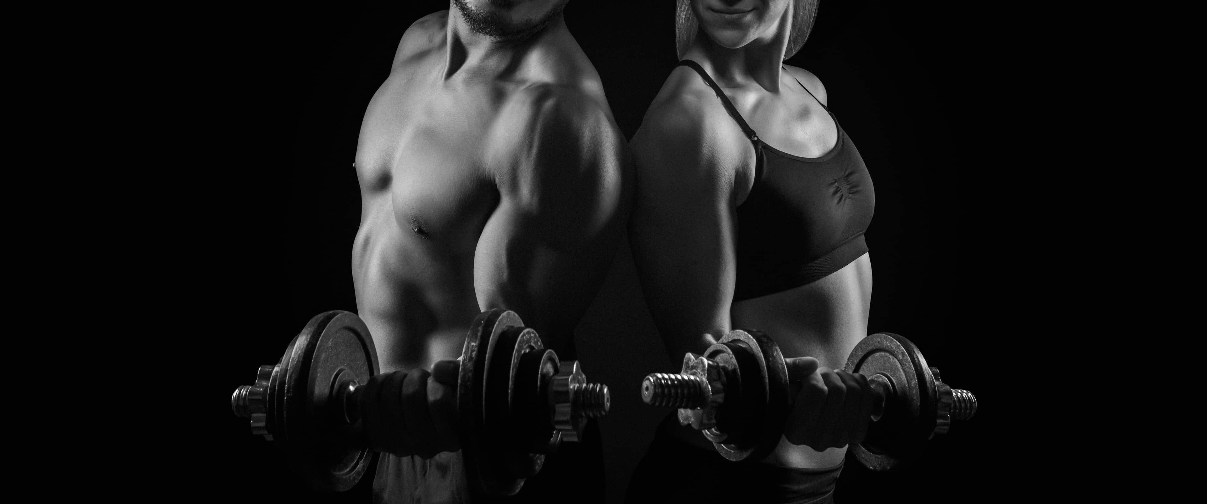 Image of Man and Woman lifting weights